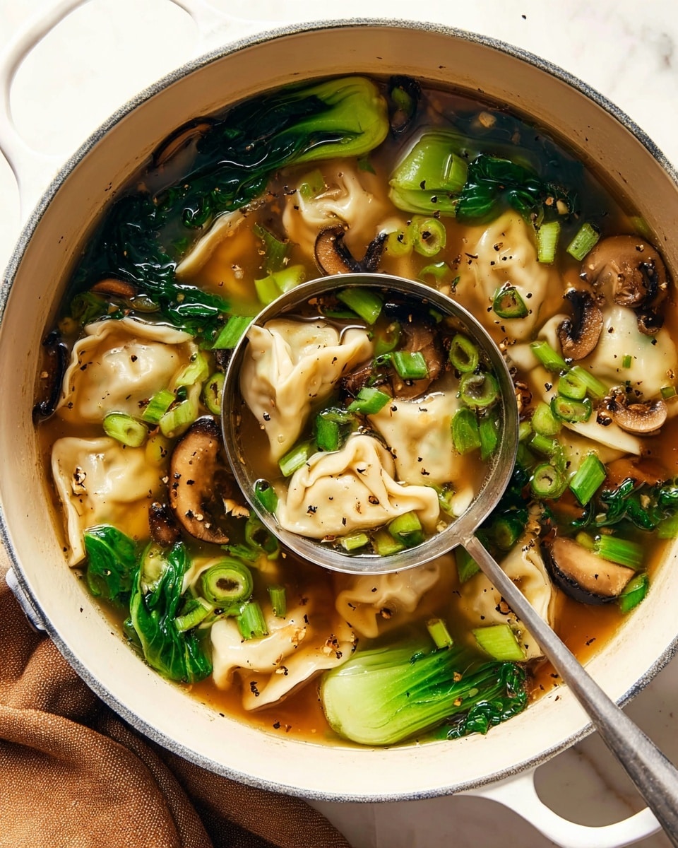 A pot of clear brown broth filled with light beige dumplings that have soft, crinkled edges floating on the surface, mixed with bright green bok choy leaves and ringed slices of green onion scattered throughout. Dark brown, thin shiitake mushroom slices add texture throughout the soup. A shiny silver ladle dips into the pot, partially holding a dumpling and green vegetables. The pot is white with a gray rim and is placed on a white marbled surface with a brown cloth underneath. Light sprinkle of ground black pepper is visible on the ingredients. Photo taken with an iphone --ar 4:5 --v 7