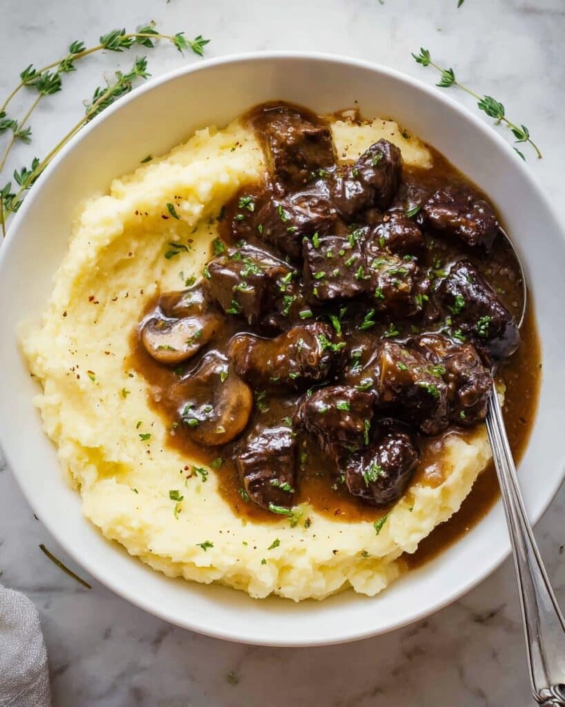 Steak Bites with Creamy Mashed Potatoes and Savory Gravy Recipe